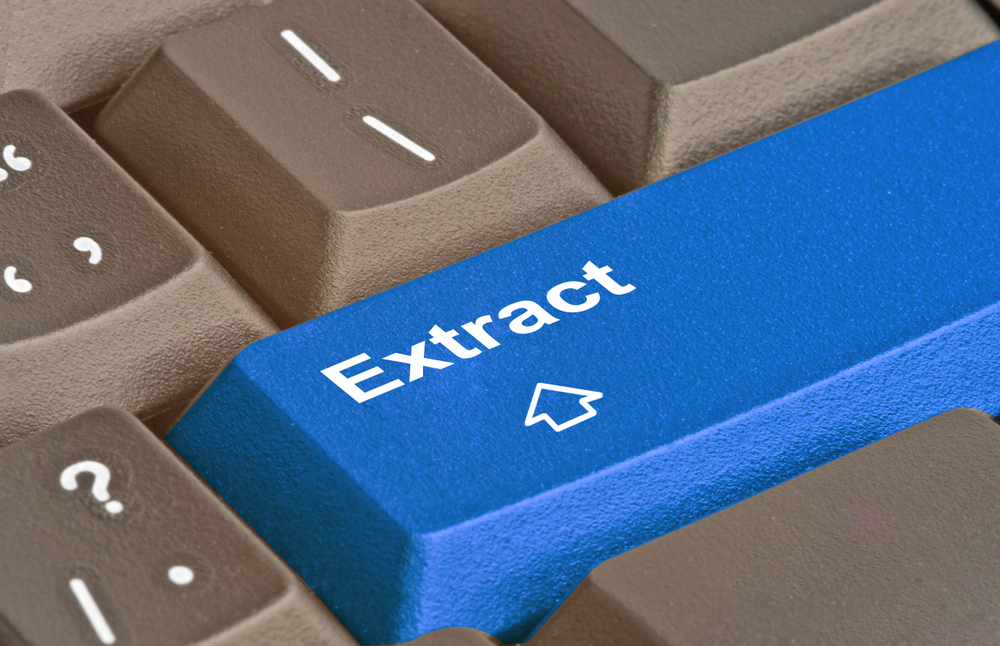 Un teclado con una tecla azul que dice Extract